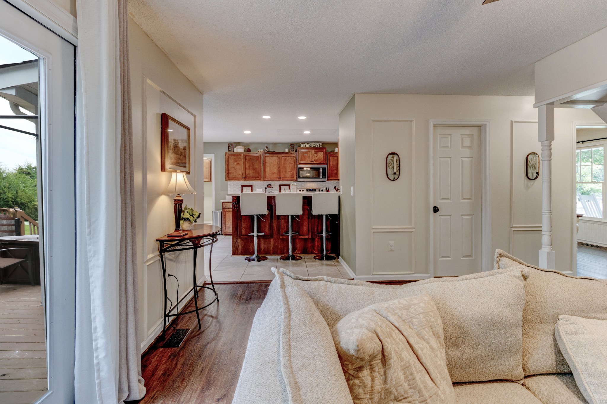 88 Chapel Road Tullahoma, TN 37388 - Photo 4 of 27 a living room with furniture and a book shelf