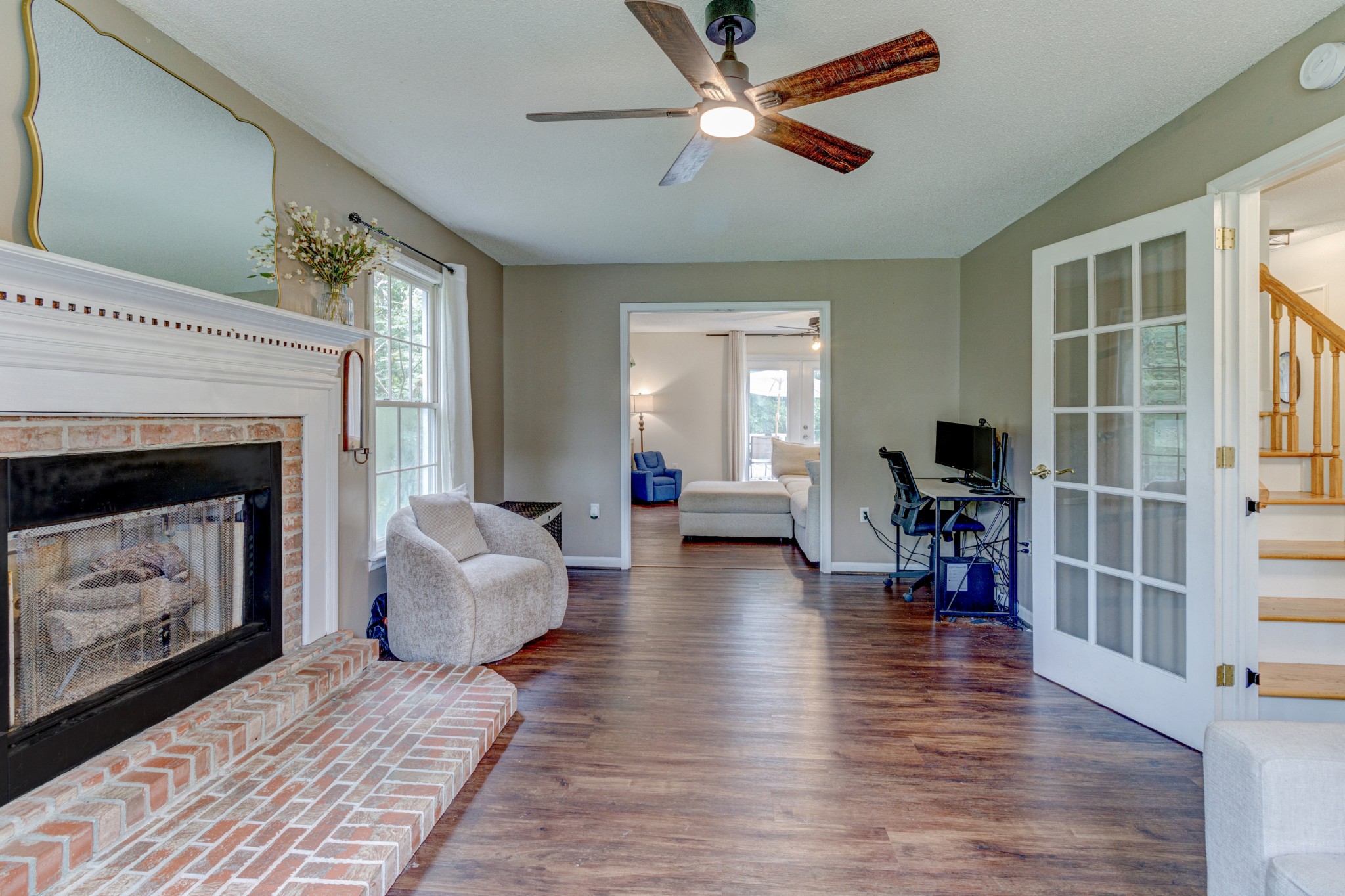 88 Chapel Road Tullahoma, TN 37388 - Photo 7 of 27 a living room with furniture a fireplace and a table