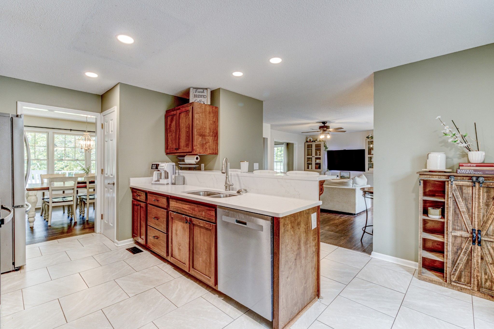 88 Chapel Road Tullahoma, TN 37388 - Photo 9 of 27 a kitchen with stainless steel appliances kitchen island granite countertop a sink and cabinets