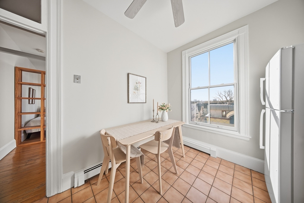 367 Somerville Avenue, Unit G Somerville, MA 02143 - Photo 16 of 39 a dining room with furniture and window
