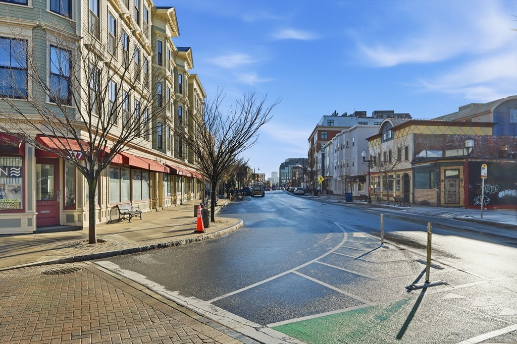 367 Somerville Avenue, Unit G Somerville, MA 02143 - Photo 33 of 39 a view of a building with many windows
