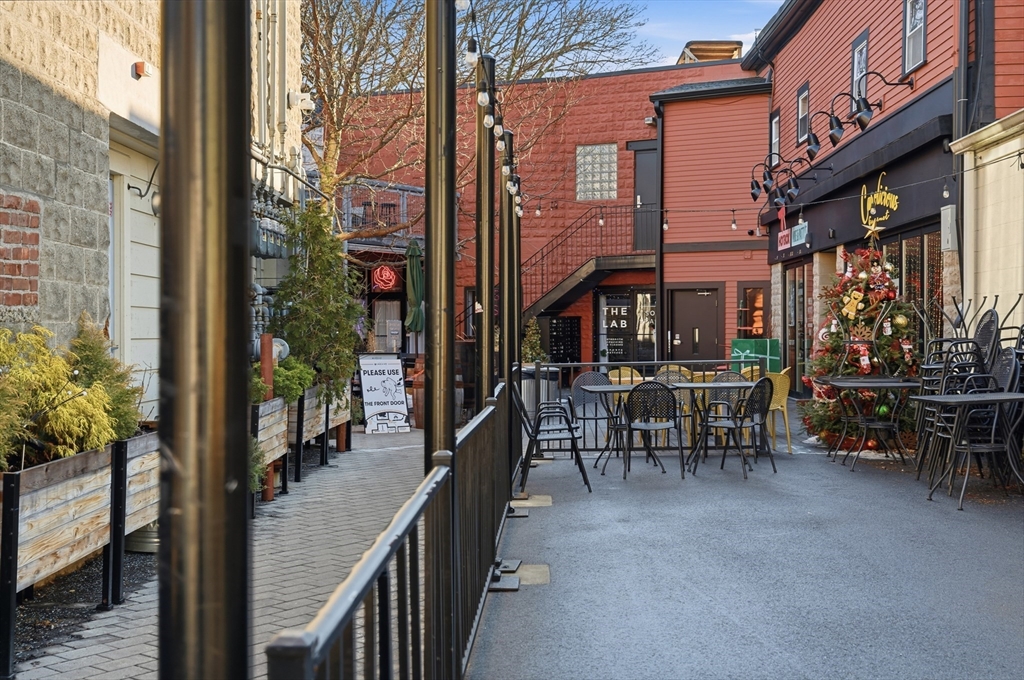 367 Somerville Avenue, Unit G Somerville, MA 02143 - Photo 38 of 39 a view of a building with sitting area