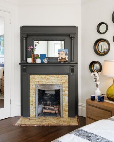 a living room with furniture and fireplace