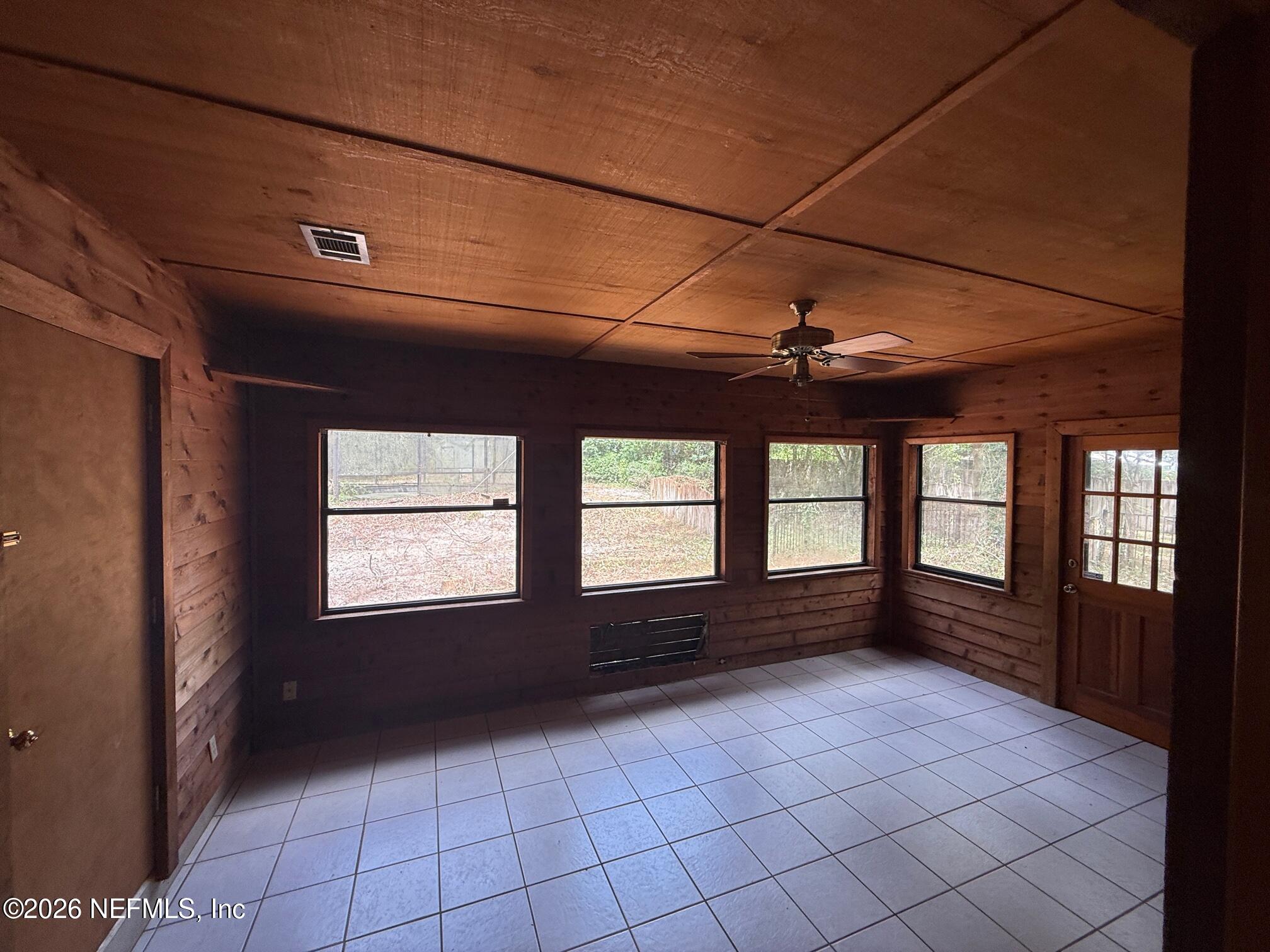 4883 Gopher Circle Middleburg, FL 32068 - Photo 18 of 29 den off kitchen access to rear