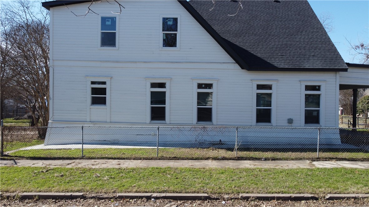 2000 Bosque Boulevard Waco, TX 76707 - Photo 37 of 51 a view of a house with a yard