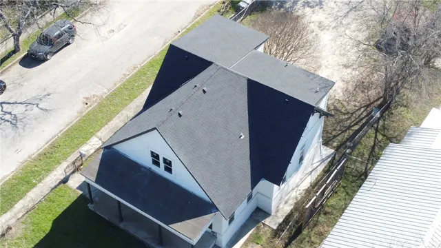 a balcony with wooden floor