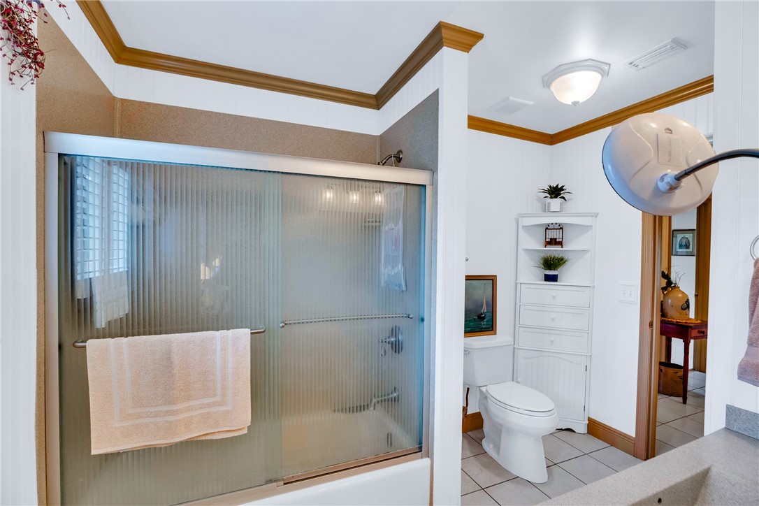7666 134th Street Sebastian, FL 32958 - Photo 14 of 35 a bathroom with a toilet and a shower