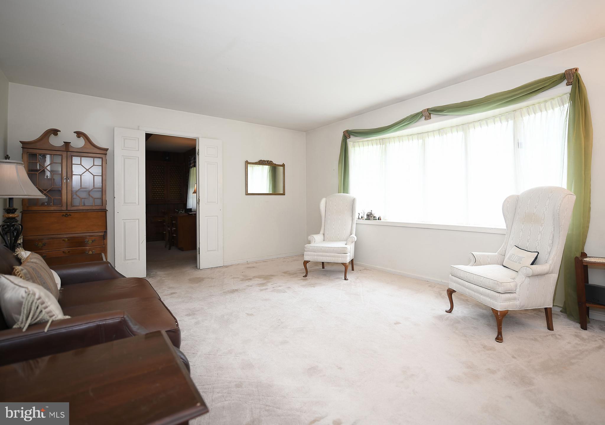1303 Old Fallston Road Fallston, MD 21047 - Photo 19 of 65 a living room with furniture and a toilet