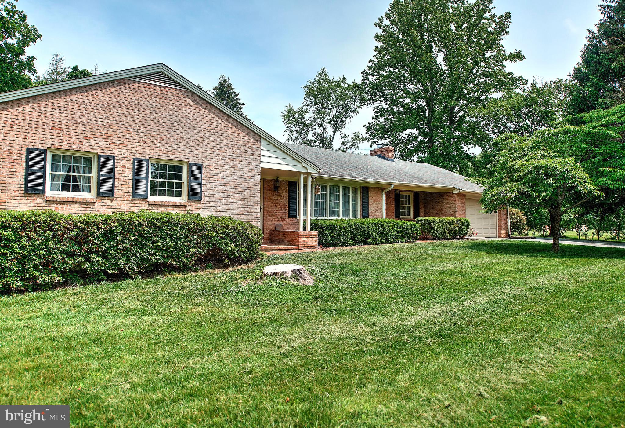 1303 Old Fallston Road Fallston, MD 21047 - Photo 4 of 65 a front view of house with yard and green space