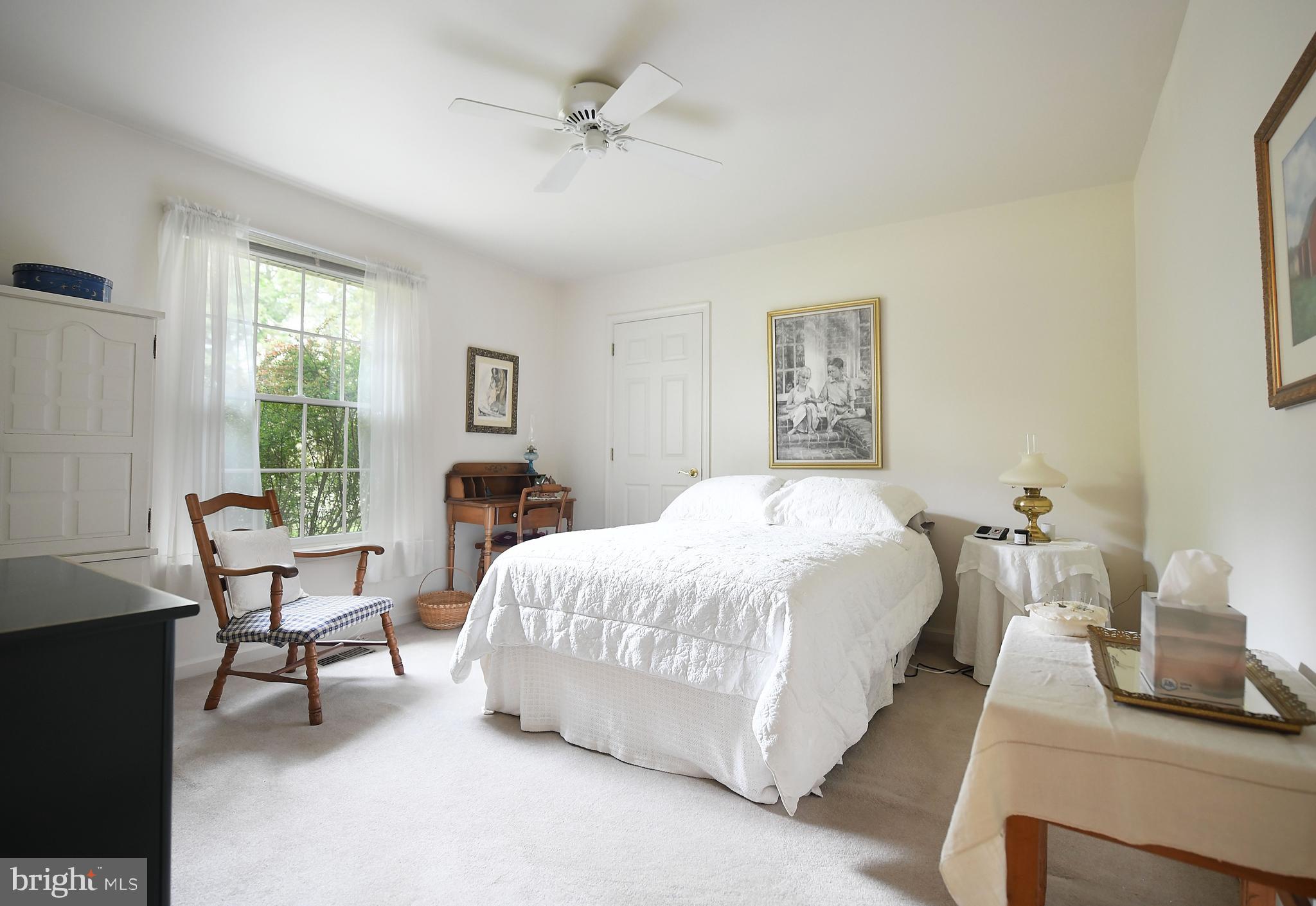 1303 Old Fallston Road Fallston, MD 21047 - Photo 52 of 65 a bed room with a bed and a chair