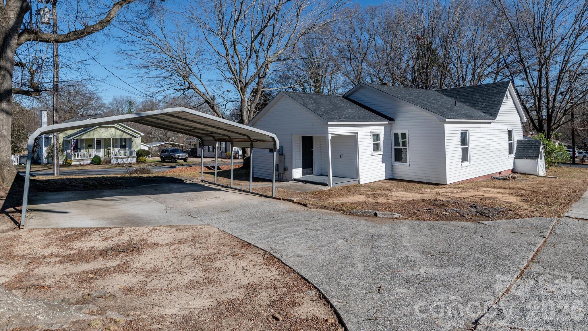 569 Hunter Avenue Kannapolis, NC 28083 - Photo 18 of 20 a view of a car park in front of house