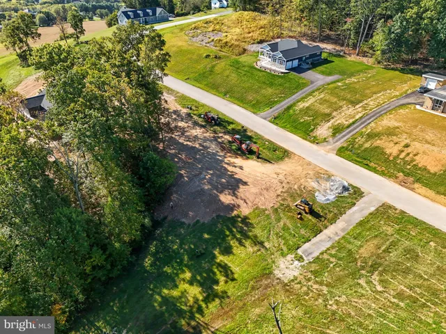 a view of a backyard with green space