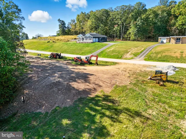 a view of a backyard of a house