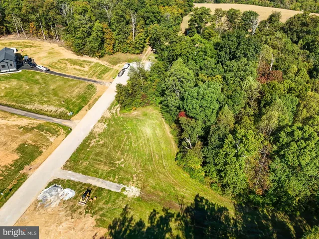 a view of swimming pool from a lake view