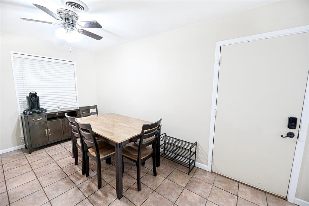 702 Decatur Street Bowie, TX 76230 - Photo 11 of 36 a view of a workspace with furniture