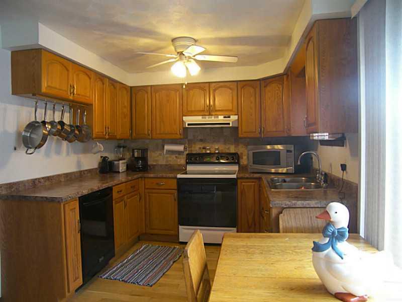 106 Santa Barbara Road Smithton, PA 15479 - Photo 5 of 19 Kitchen. Kitchen with dishwasher, electric stove, side-by-side fridge