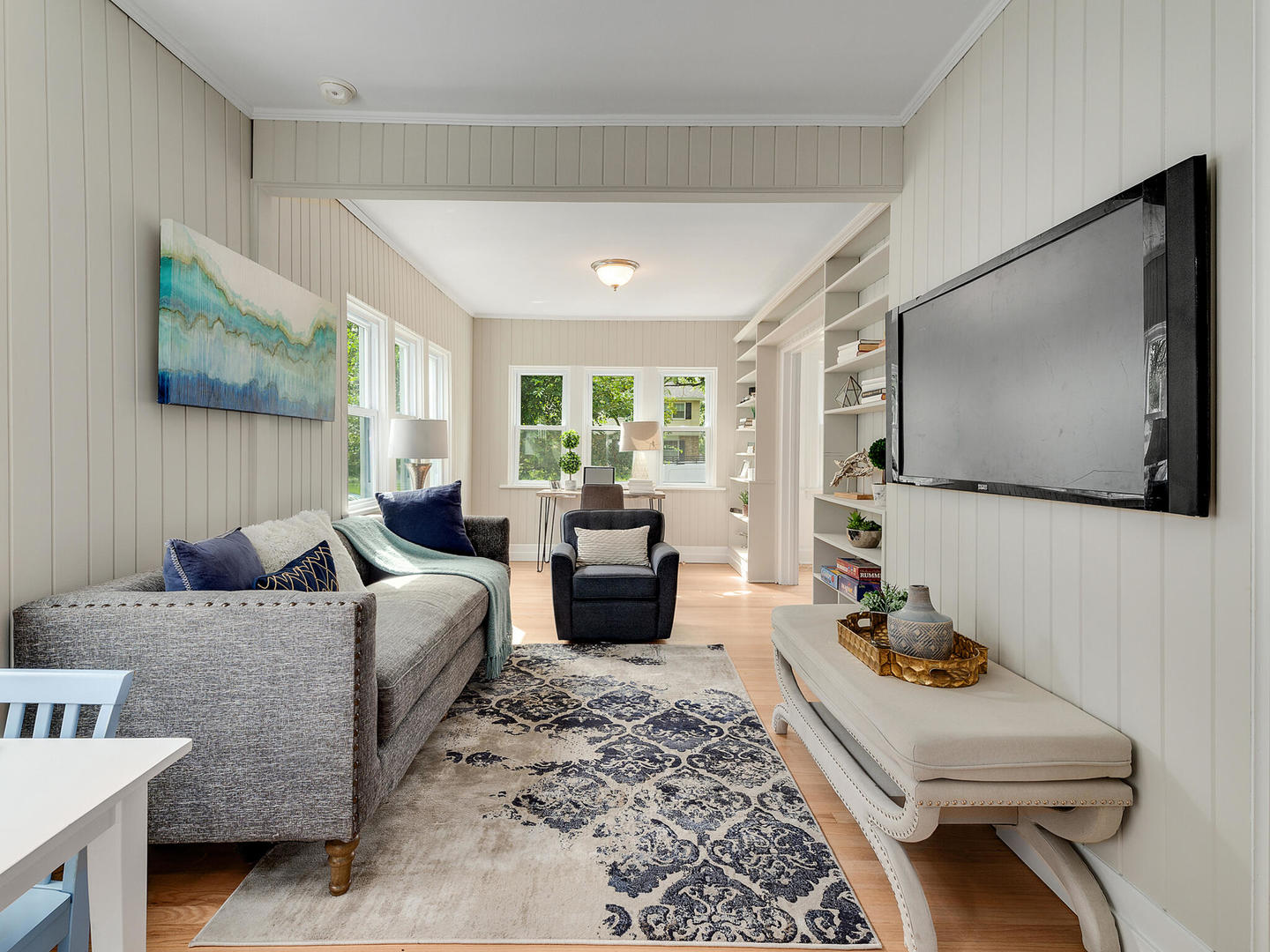 161 E Road Glen Ellyn, IL 60137 - Photo 12 of 27 a living room with furniture and a flat screen tv
