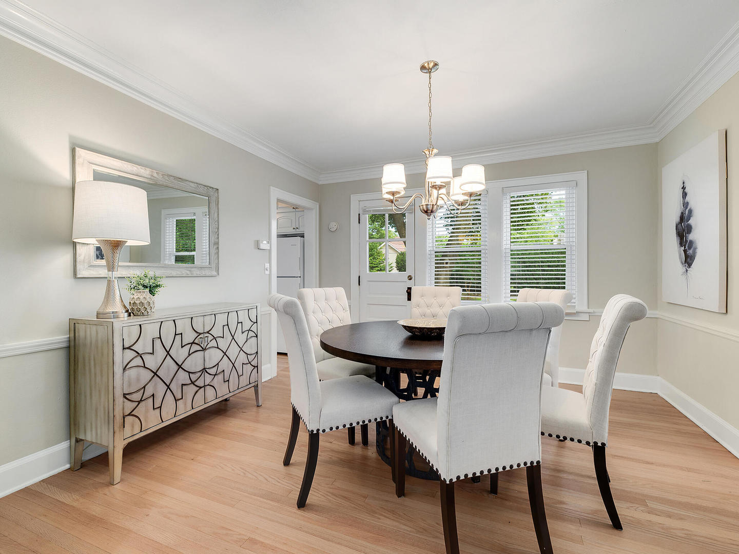 161 E Road Glen Ellyn, IL 60137 - Photo 13 of 27 a view of a a dining room with furniture window and wooden floor