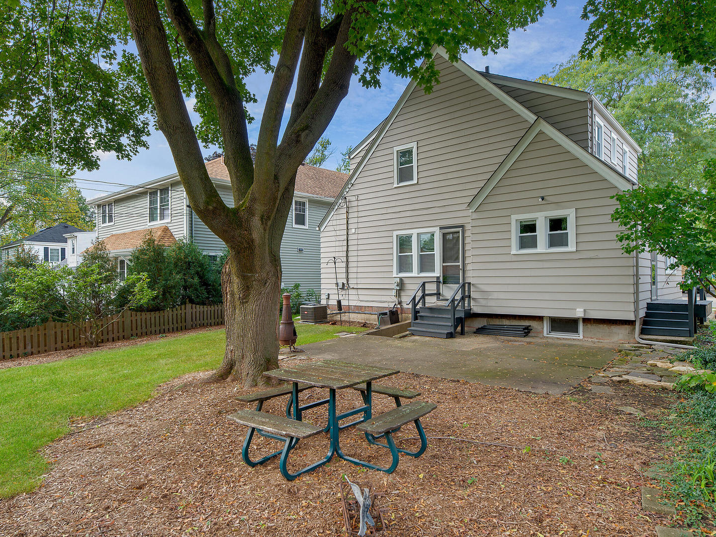 161 E Road Glen Ellyn, IL 60137 - Photo 25 of 27 a view of a house with backyard and a tree