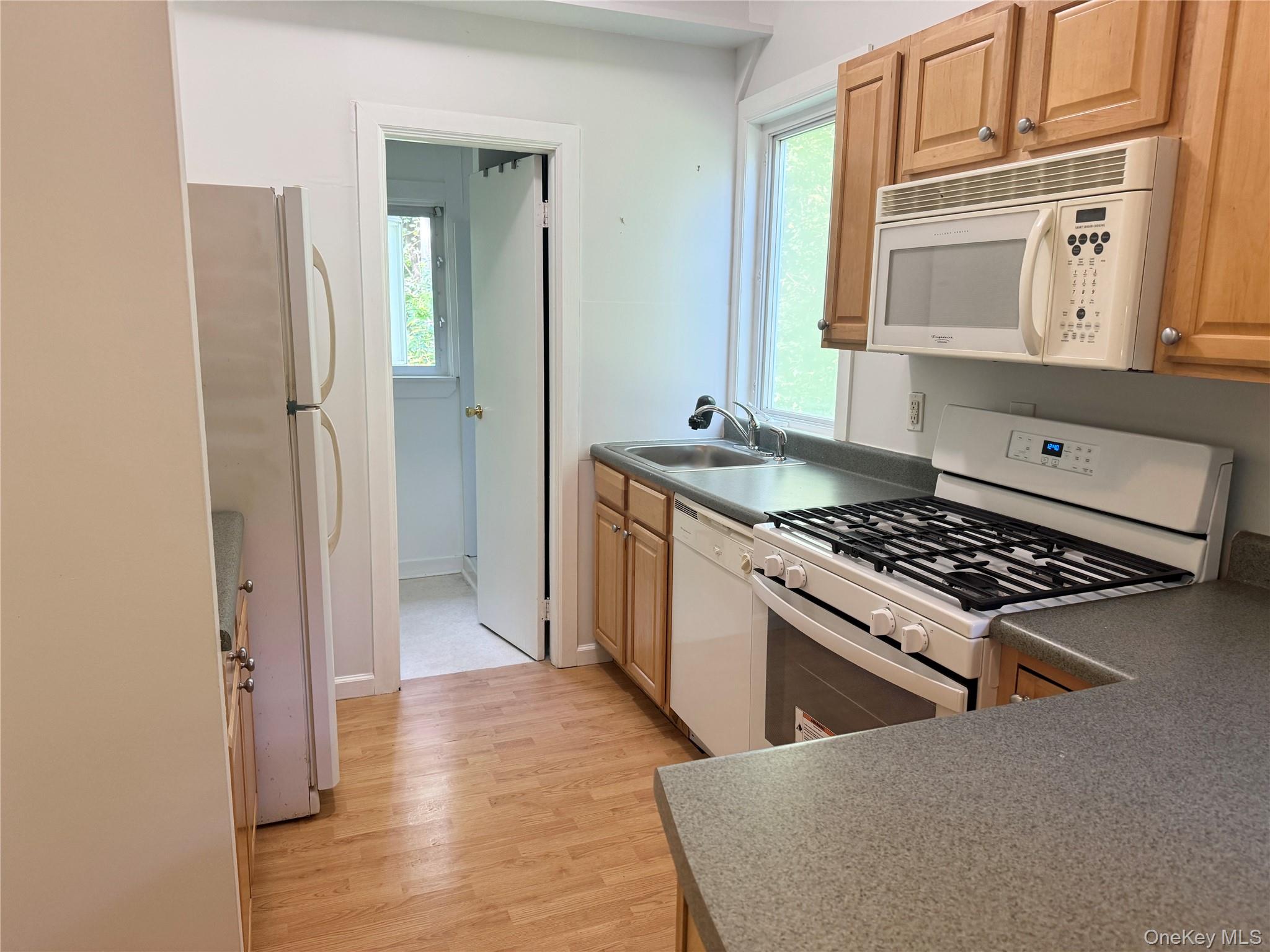 21 Derussey Lane Cornwall, NY 12518 - Photo 2 of 9 a kitchen with stainless steel appliances granite countertop a stove and a refrigerator