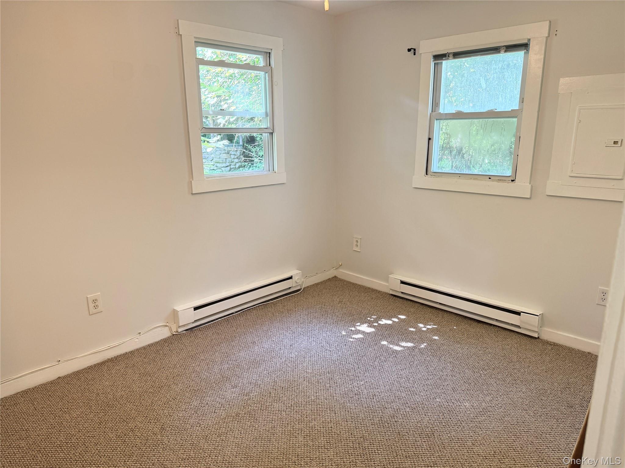 21 Derussey Lane Cornwall, NY 12518 - Photo 4 of 9 an empty room with a window