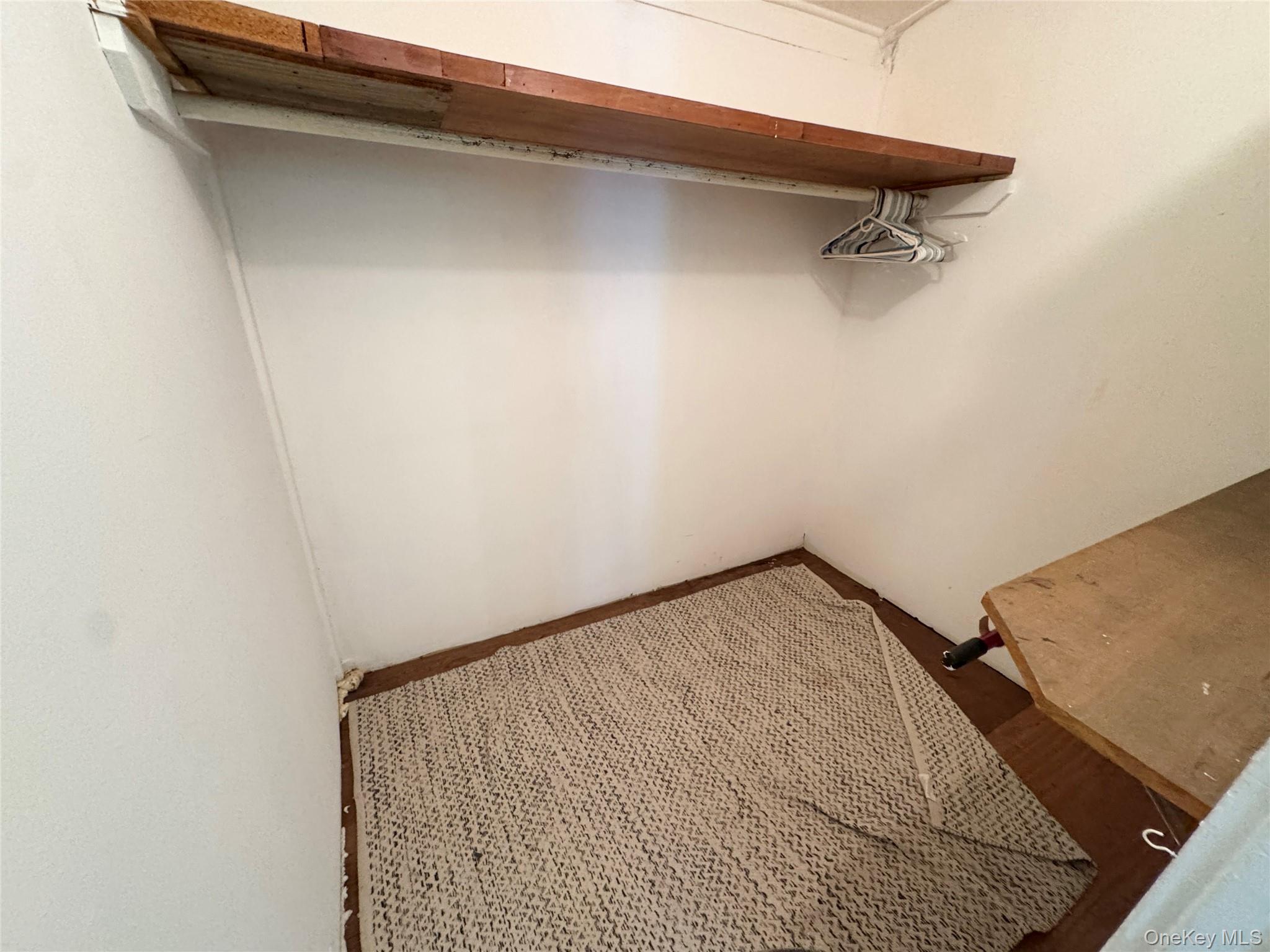 21 Derussey Lane Cornwall, NY 12518 - Photo 7 of 9 a view of a room with rack on the wall