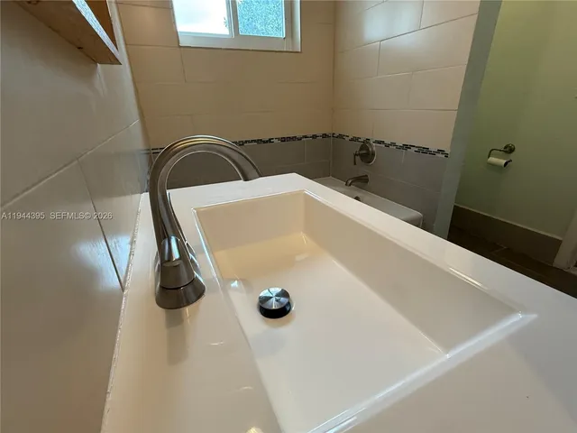 a bathroom with a tub