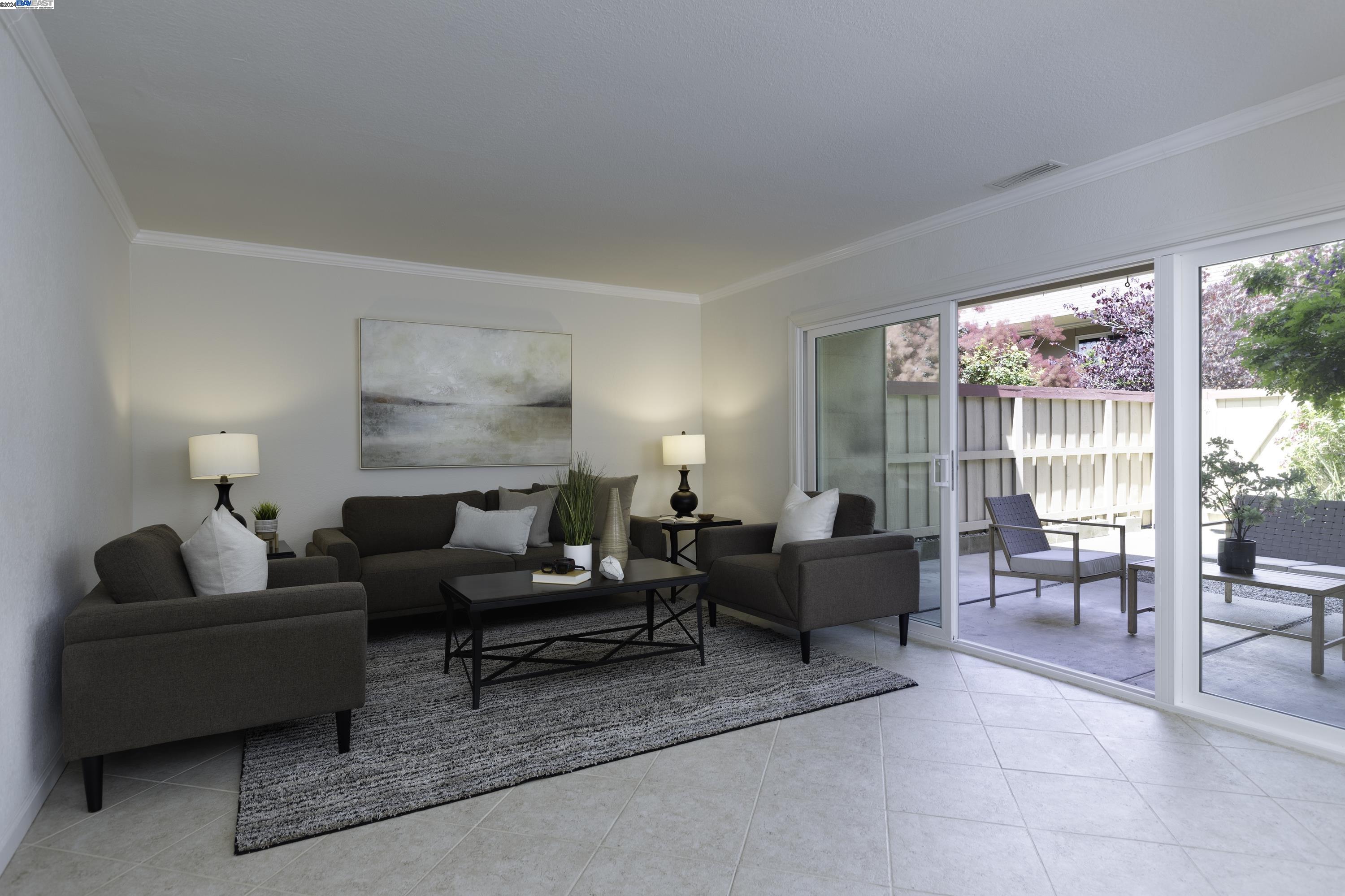 1006 Bancroft Road Concord, CA 94518 - Photo 1 of 1 a living room with furniture and a large window