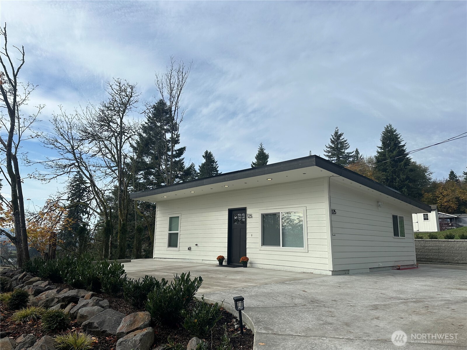 125 Foxglove Terrace Longview, WA 98632 - Photo 16 of 20 a house that has a tree in front of it