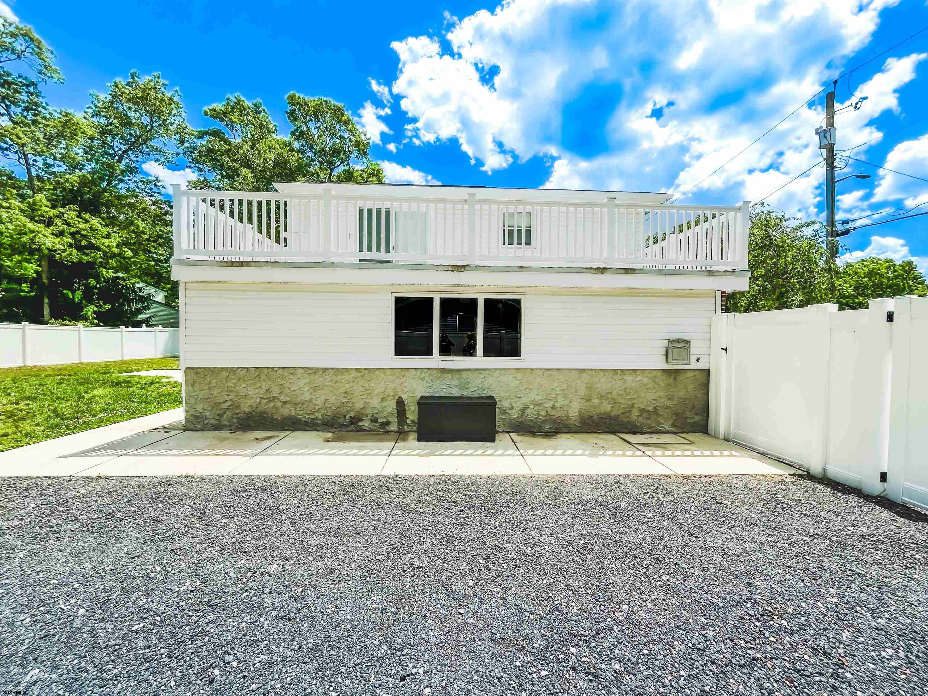 518 Delaware Avenue Absecon, NJ 08201 - Photo 37 of 38 a house view with a garden space