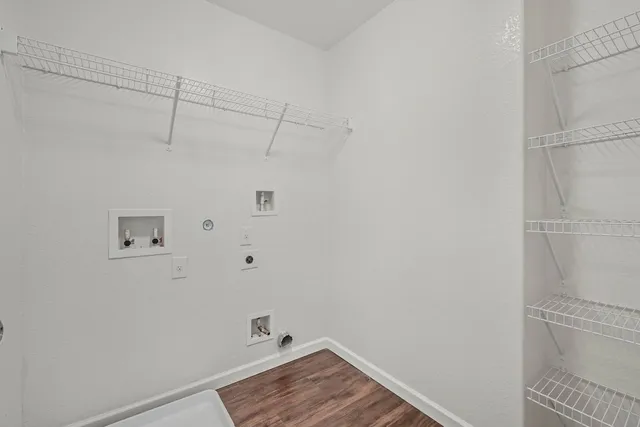 a view of a room with racks on the wall