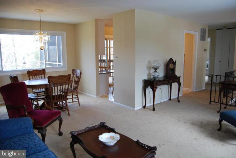 17317 Fletchall Road Poolesville, MD 20837 - Photo 18 of 18 a view of a livingroom with furniture and a window