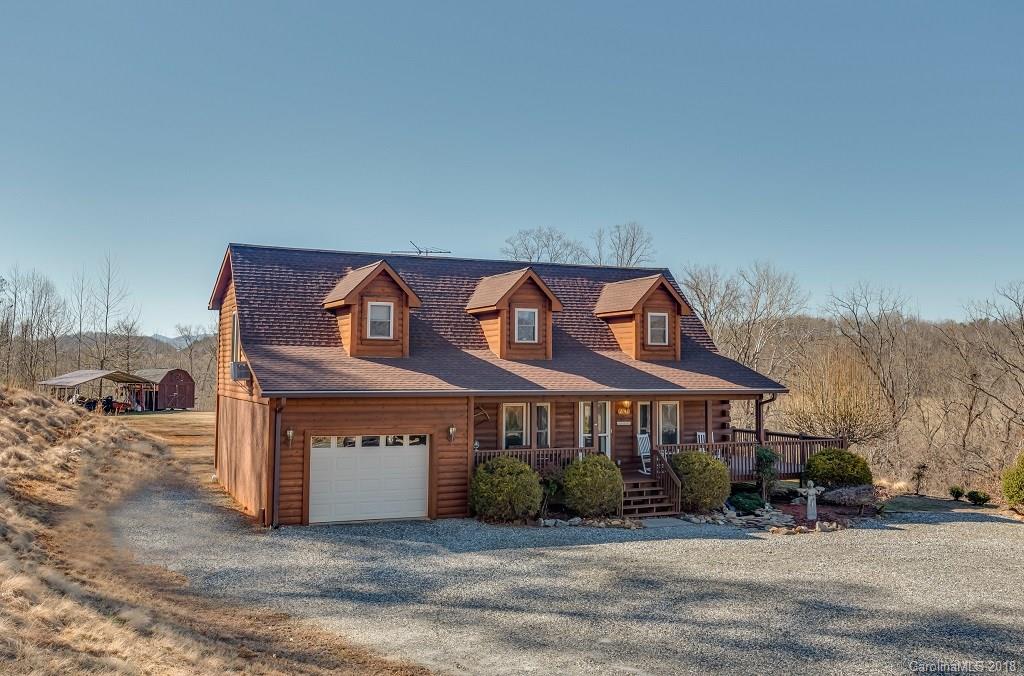 2141 Coxe Road, Unit 96 Rutherfordton, NC 28139 - Photo 1 of 25 a front view of a house with a yard