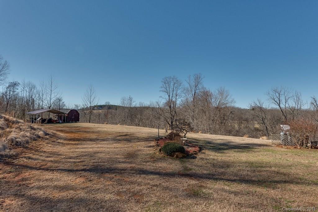 2141 Coxe Road, Unit 96 Rutherfordton, NC 28139 - Photo 2 of 25 a view of a backyard of a house
