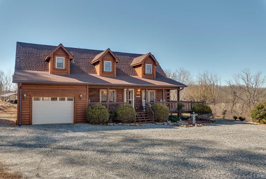 2141 Coxe Road, Unit 96 Rutherfordton, NC 28139 - Photo 23 of 25 a front view of a house with a yard