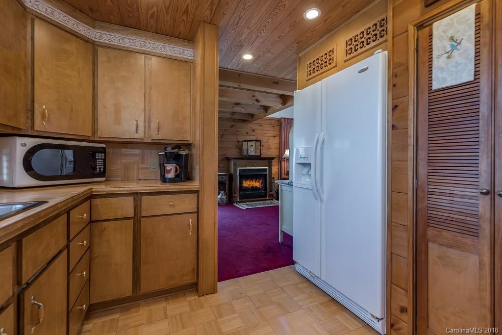 2141 Coxe Road, Unit 96 Rutherfordton, NC 28139 - Photo 7 of 25 a kitchen with stainless steel appliances granite countertop a refrigerator and a sink