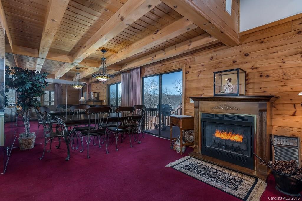 2141 Coxe Road, Unit 96 Rutherfordton, NC 28139 - Photo 9 of 25 a living room with furniture and a fireplace