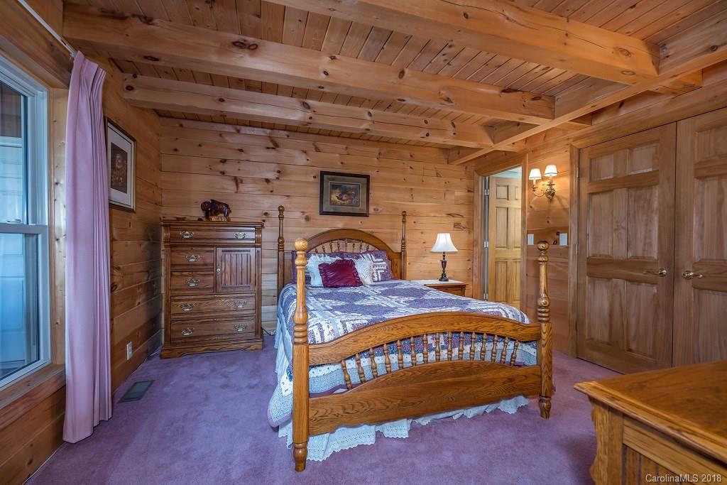 2141 Coxe Road, Unit 96 Rutherfordton, NC 28139 - Photo 10 of 25 a bedroom with a bed and a dresser