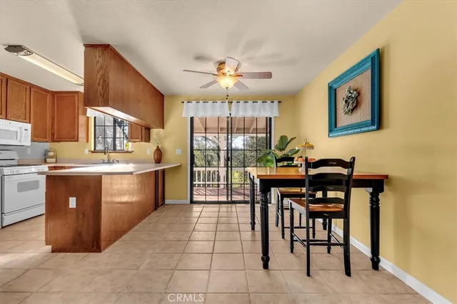 a kitchen with a cabinets a sink and appliances