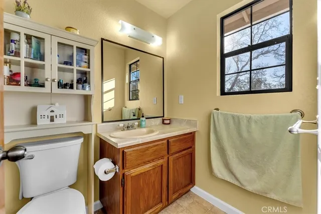 a bed room with a bed and a chandelier