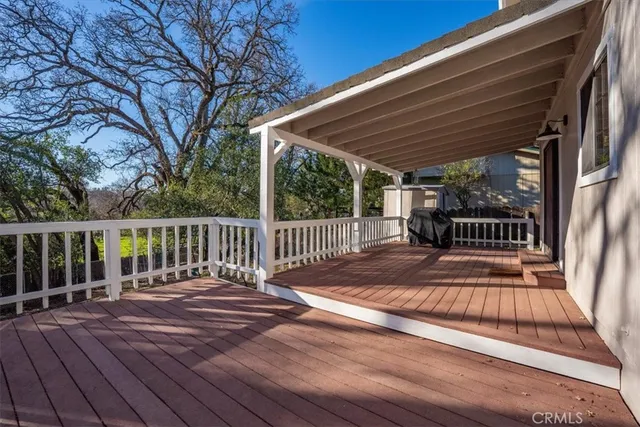 a view of balcony with wooden floor