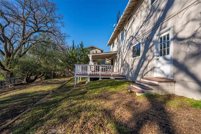 a house that has tree in front of it