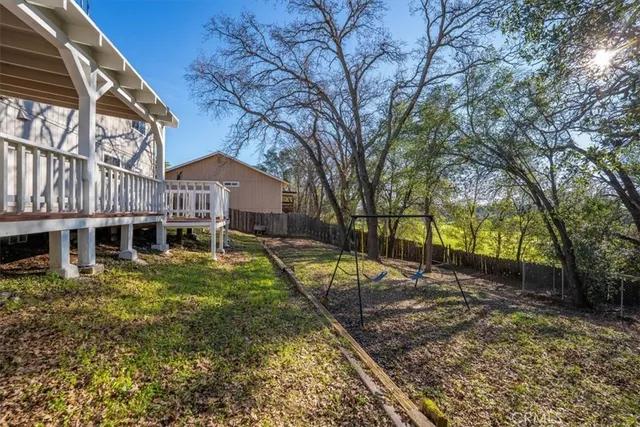 a view of backyard with green space