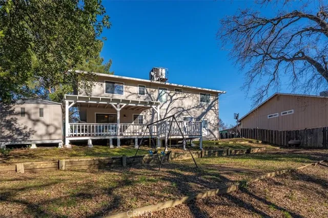 a house with trees in front of it