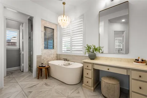 a bathroom with a sink and mirror