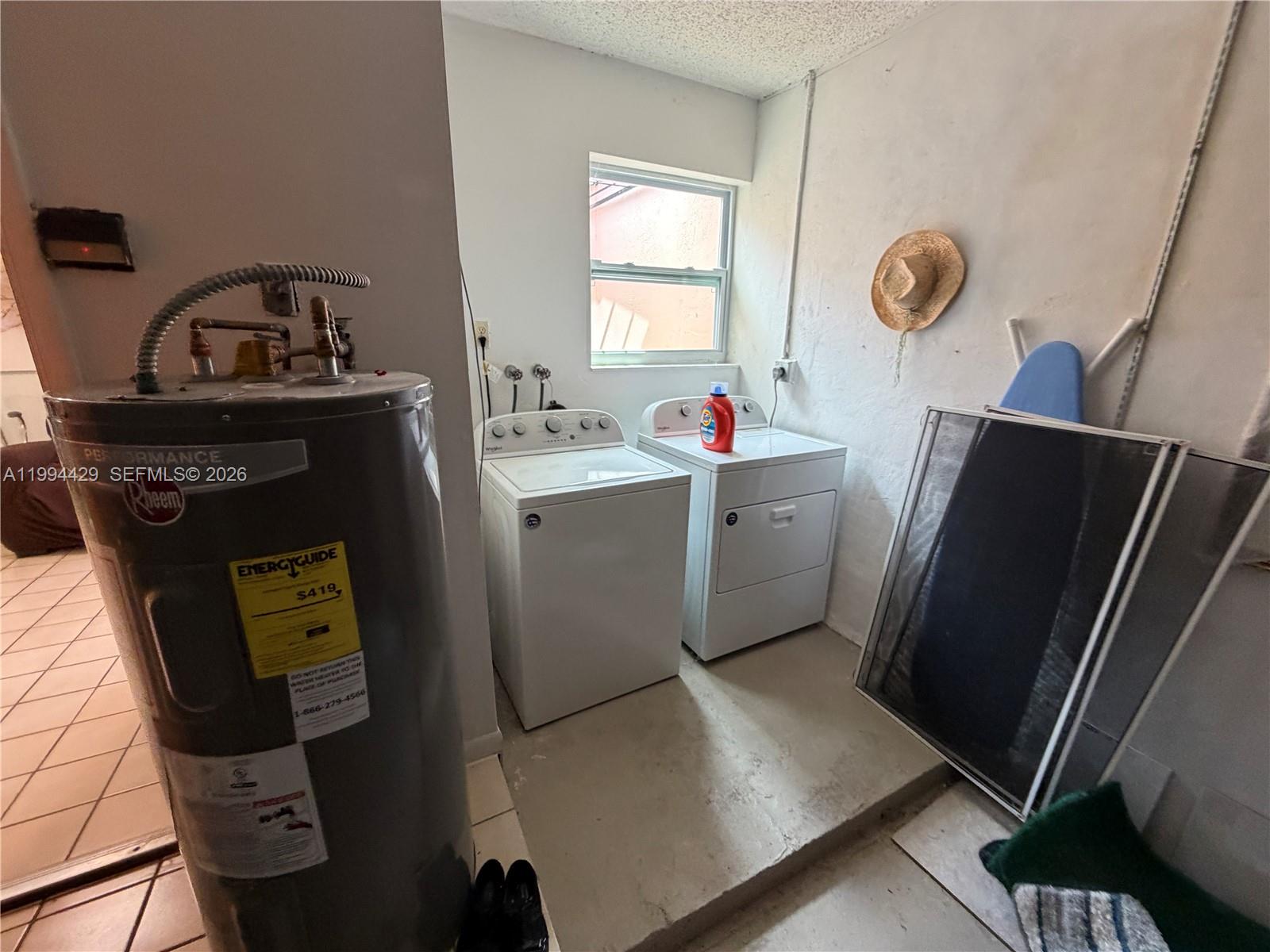 13470 Southwest 27th Street Miami, FL 33175 - Photo 11 of 11 a room with storage and utility