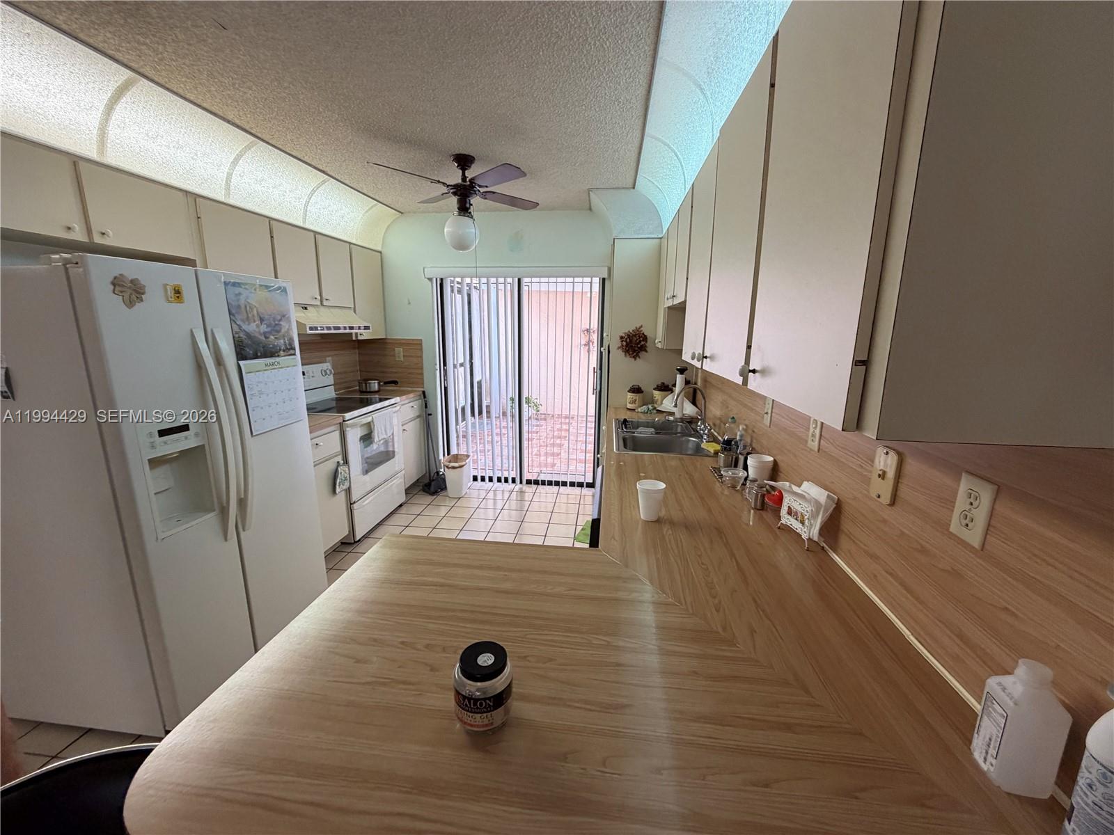 13470 Southwest 27th Street Miami, FL 33175 - Photo 7 of 11 a view of a kitchen with a sink