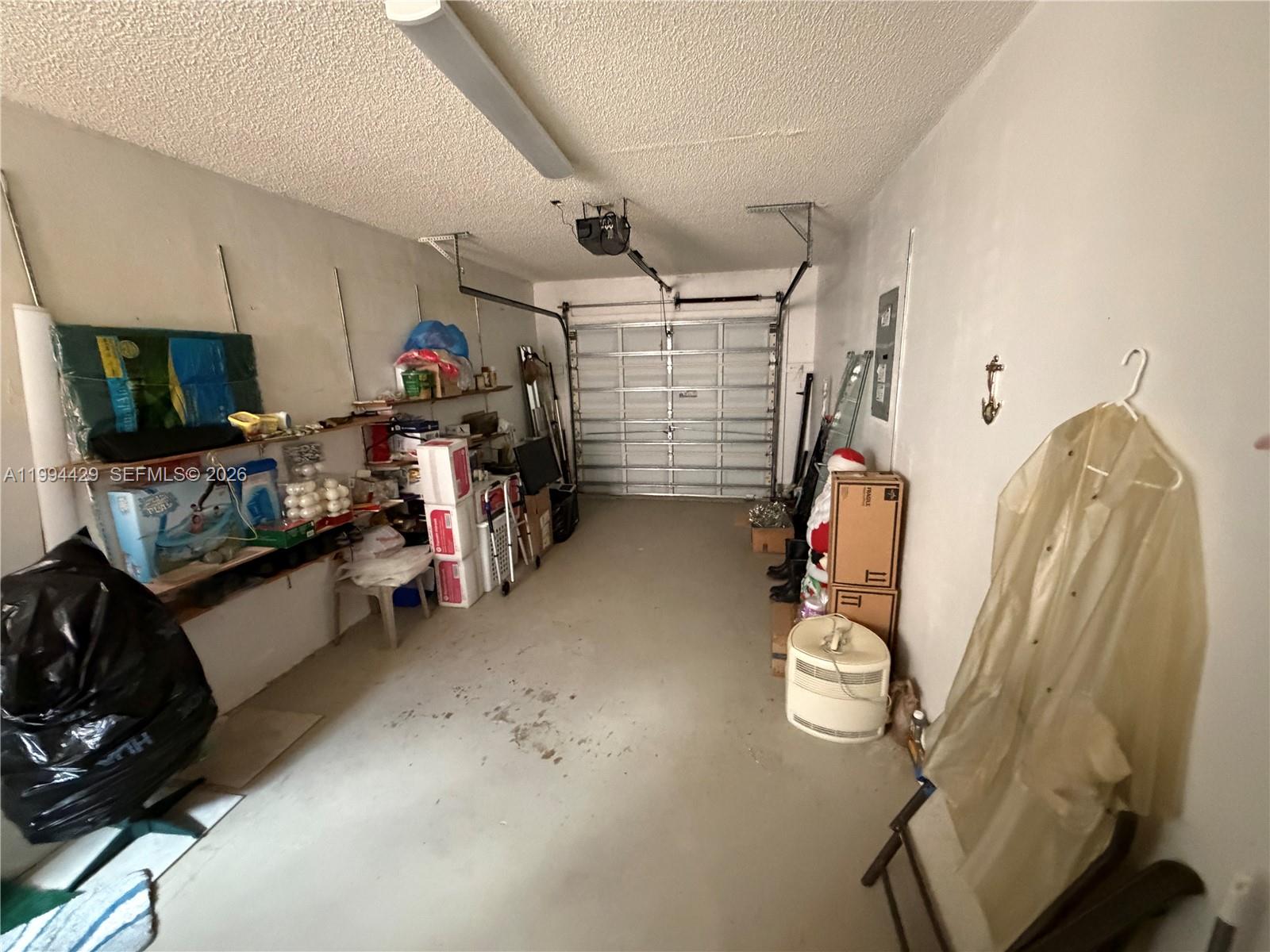 13470 Southwest 27th Street Miami, FL 33175 - Photo 10 of 11 a view of a room with gym equipment