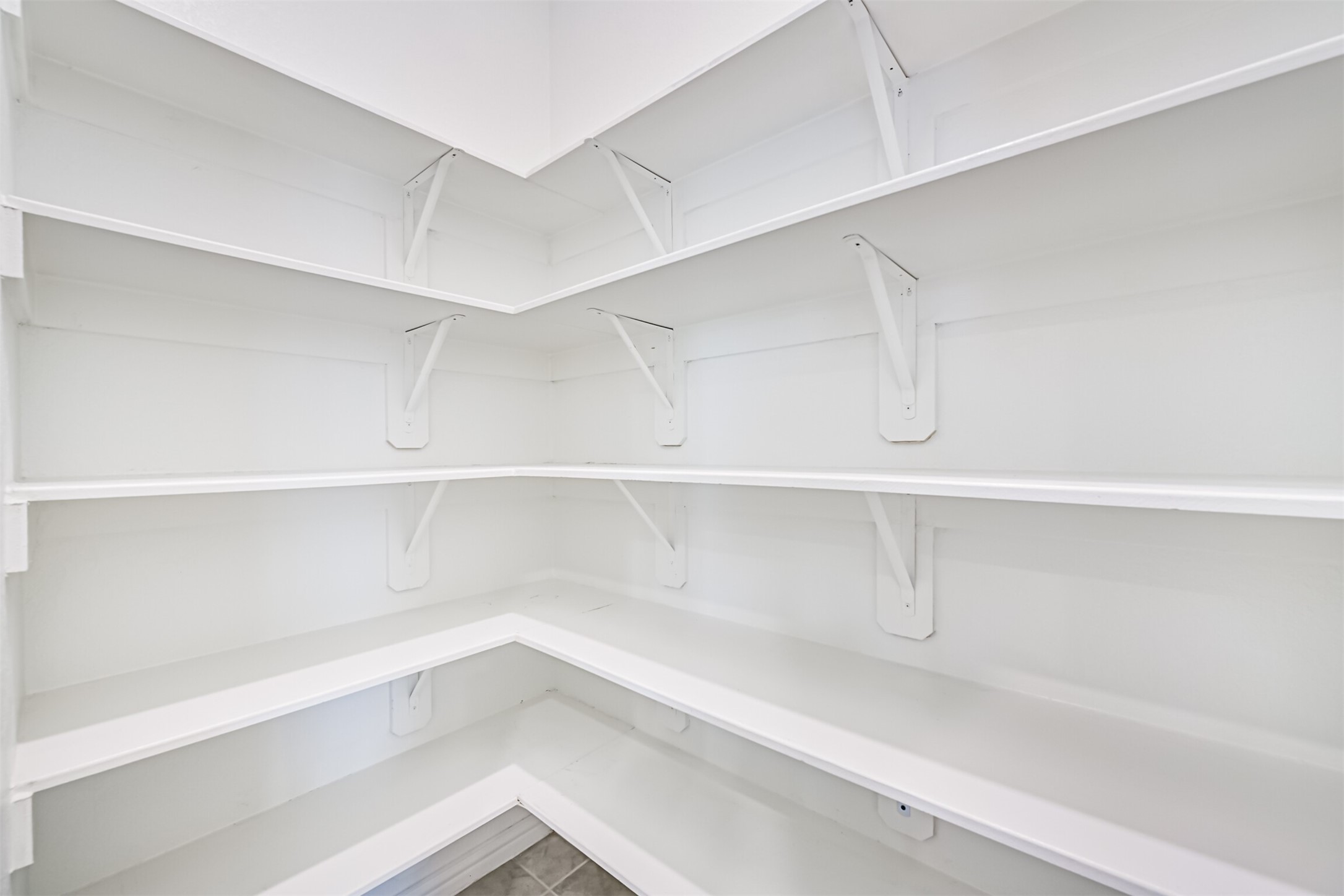 7019 Terra Drive Manvel, TX 77578 - Photo 41 of 41 a view of walk in closet with empty racks