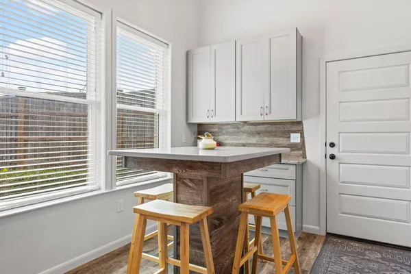 a view of kitchen with breakfast area